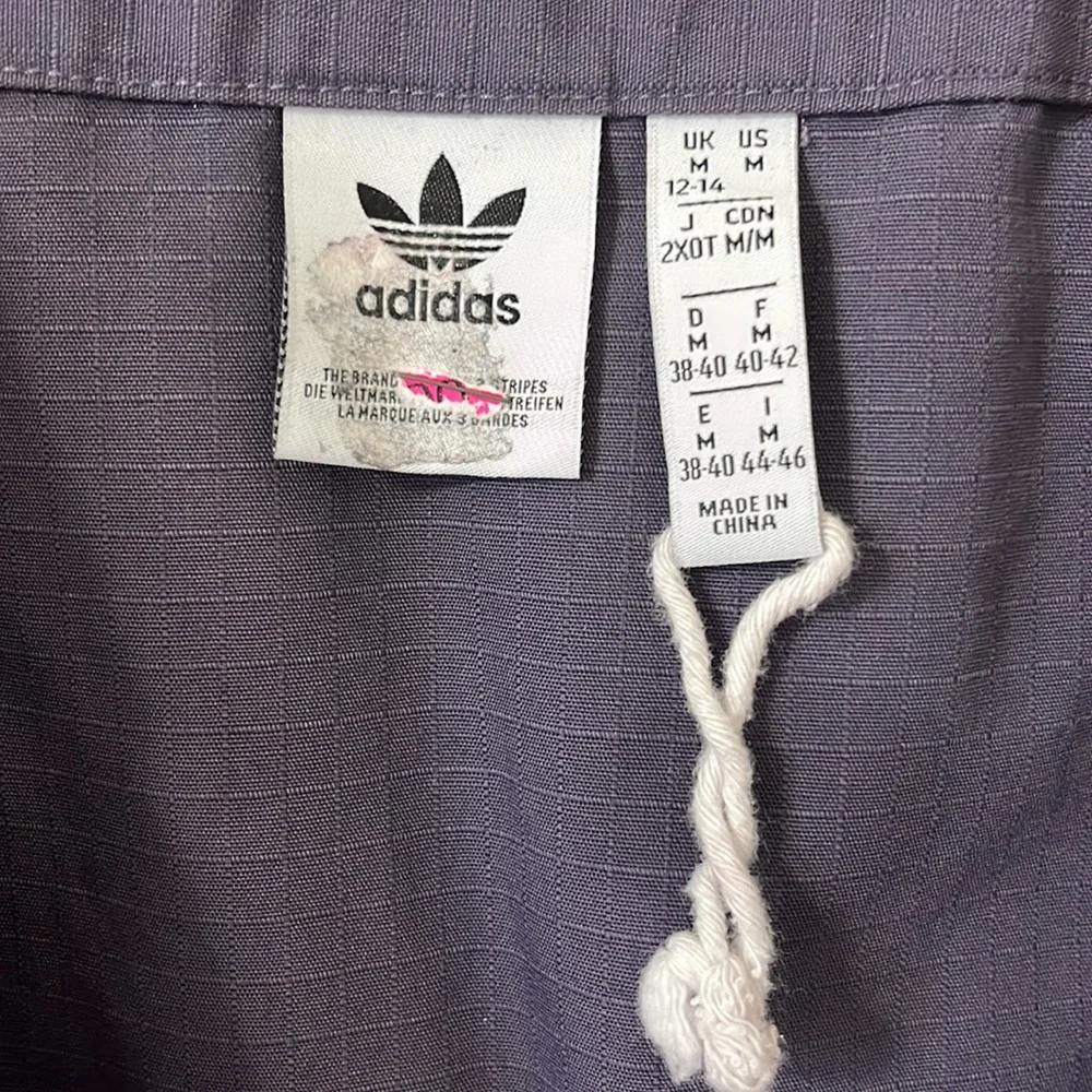 Adidas Originals Reveal Your Voice Ripstop Zip-Front Mini Skirt Purple Size M